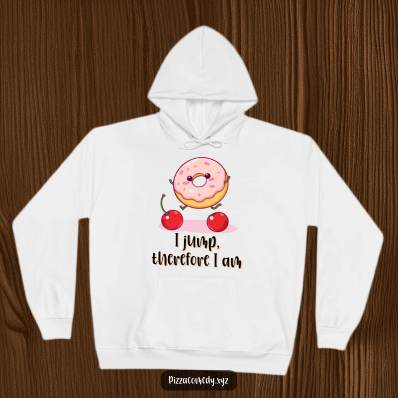 Funny Donut Hoodie: A wobbly jelly donut with legs is mid-leap, comically reaching for a cherry, illustrating playful determination.