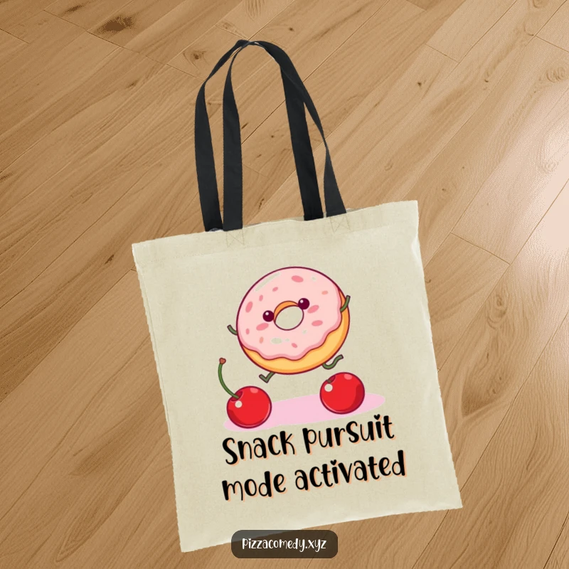 Funny Donut Tote Bag: A wobbly donut with legs stretches up to grab a falling cherry, a humorous and delightful design.